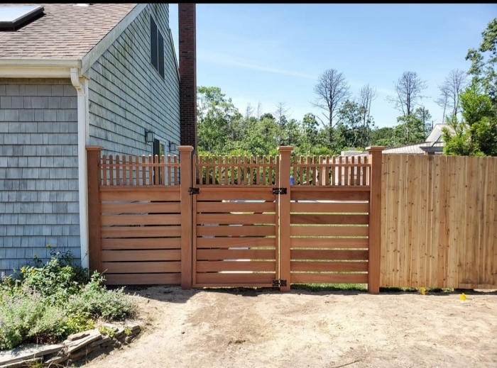 Horizontal Cedar Board Fence with Open Spindle Top