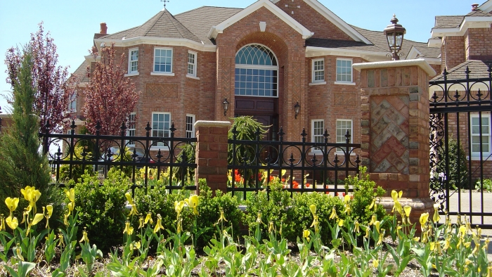 Estate Fence Across Front Yard with Brick Columns.